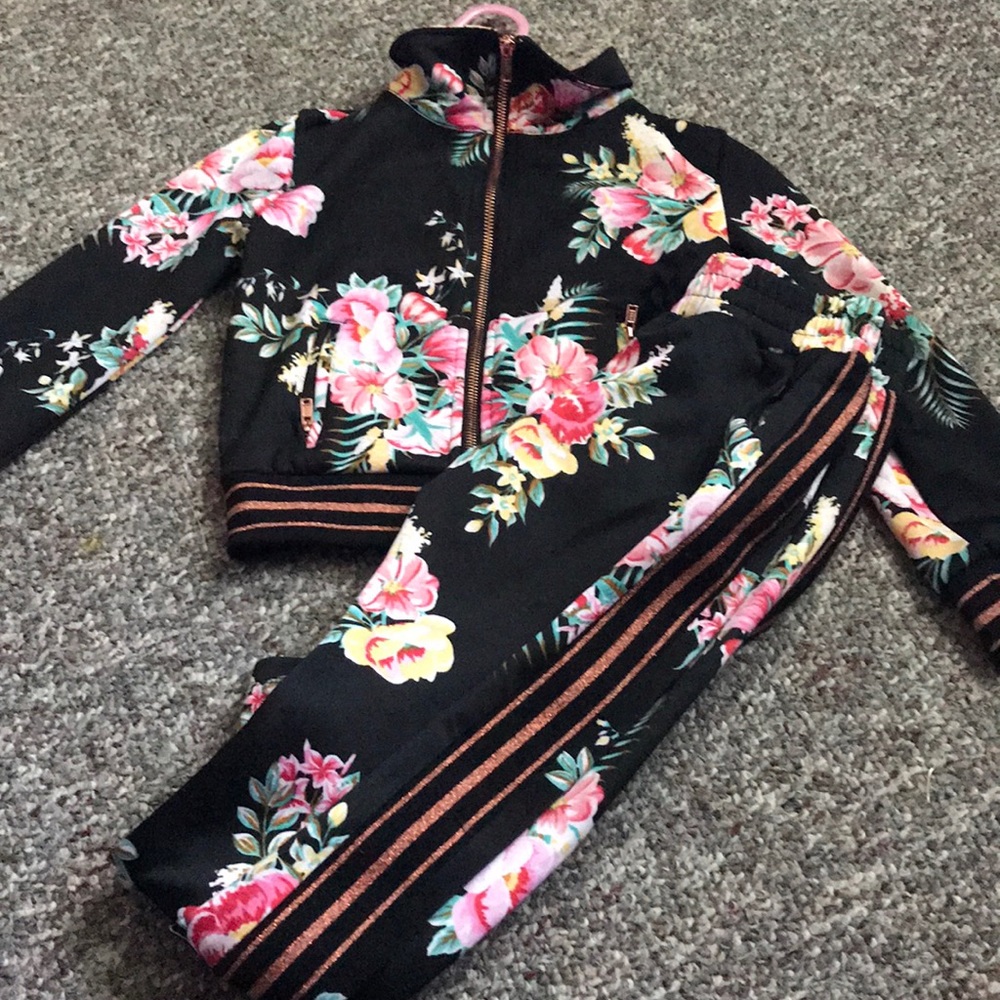 Cute black floral print jacket with gold lining